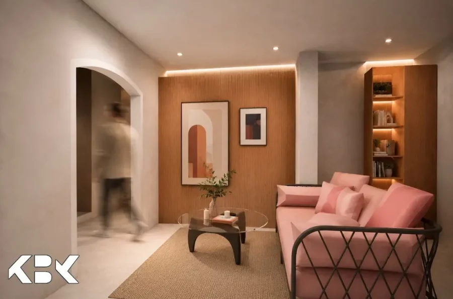 Rendu 3D du salon d'une villa contemporaine. Vue sur un canapé rose moderne avec structure en métal noir, une table basse en verre, un tapis en fibres naturelles et un mur habillé de tasseaux de bois rétroéclairés.